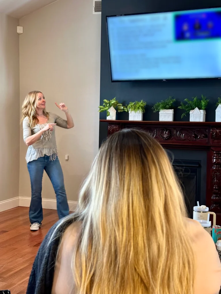 Stephanie Cleck During a Team Meeting - Founder of Concihairge, A Private Hair Salon on the Main Line