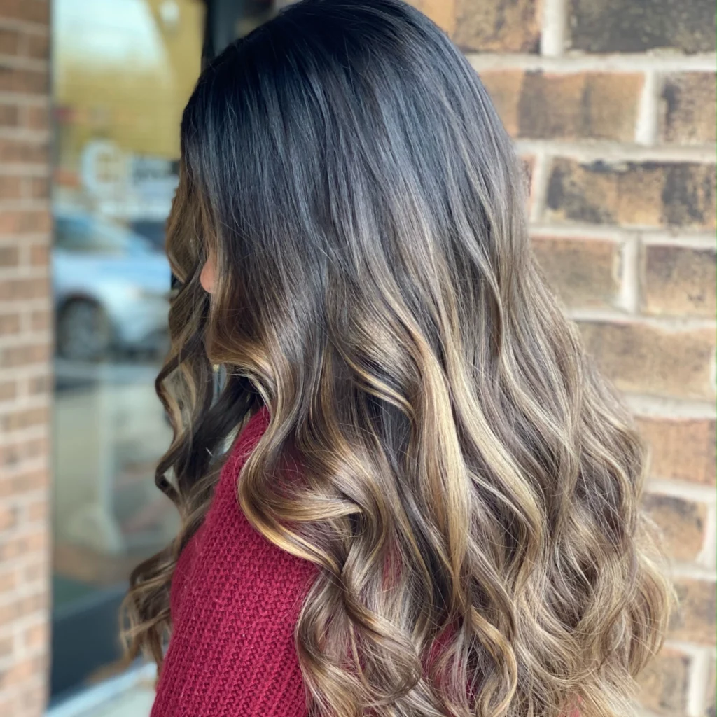 Dark brown to blonde balayage by Master Hair Colorist in Chester and Delaware County, Cassie Anderson