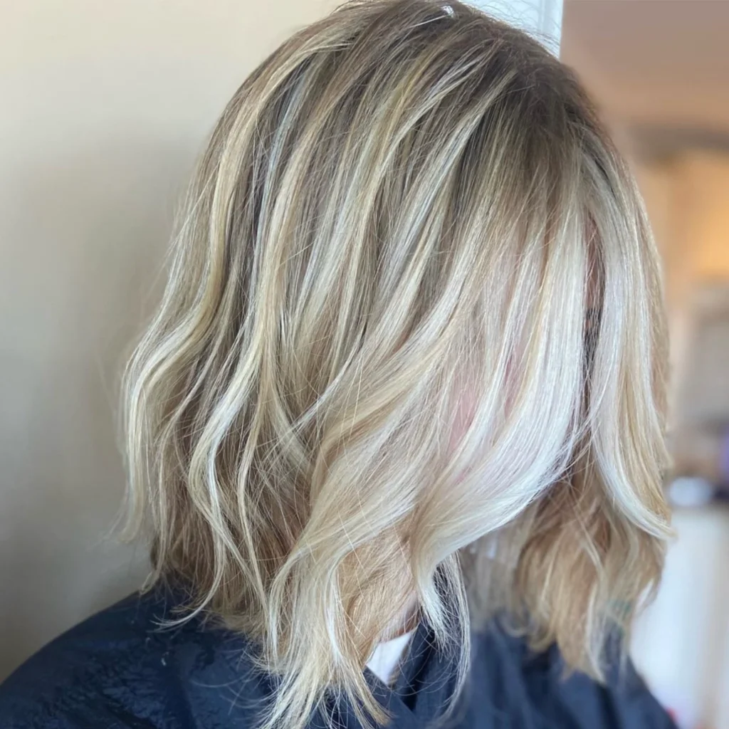 Light blonde highlights by Private Hair Extensions Specialist in Chester and Delaware County, PA, Corissa Benn